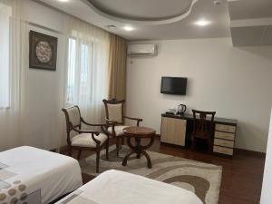 TV a/nebo společenská místnost v ubytování Vanatur Hotel