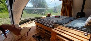 Кровать или кровати в номере GLAMPING SLOVENSKO