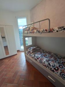 Letto o letti in una camera di GIULIA e ANDREA