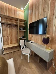 TV a/nebo společenská místnost v ubytování Bed & Breakfast Piazza Duomo