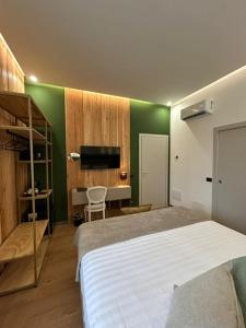 Postel nebo postele na pokoji v ubytování Bed & Breakfast Piazza Duomo