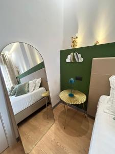 Postel nebo postele na pokoji v ubytování Bed & Breakfast Piazza Duomo