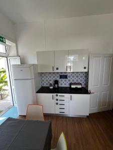 Kuchyň nebo kuchyňský kout v ubytování Lazareto 148 Hostel