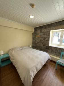 Postel nebo postele na pokoji v ubytování Lazareto 148 Hostel