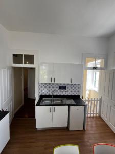Kuchyň nebo kuchyňský kout v ubytování Lazareto 148 Hostel