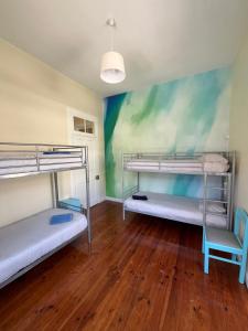 Postel nebo postele na pokoji v ubytování Lazareto 148 Hostel