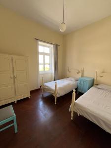 Postel nebo postele na pokoji v ubytování Lazareto 148 Hostel
