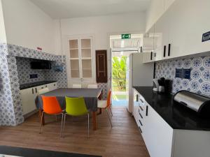 Kuchyň nebo kuchyňský kout v ubytování Lazareto 148 Hostel