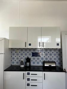 Kuchyň nebo kuchyňský kout v ubytování Lazareto 148 Hostel