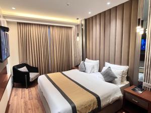 Postel nebo postele na pokoji v ubytování Western Blu INN