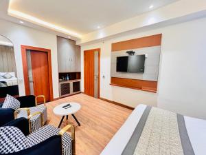 TV a/nebo společenská místnost v ubytování Western Blu INN