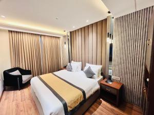 Postel nebo postele na pokoji v ubytování Western Blu INN