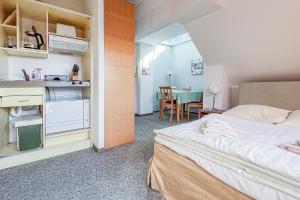 Ένα ή περισσότερα κρεβάτια σε δωμάτιο στο Villa Viktoria Whg 22 - "Min lütt Stuuv"