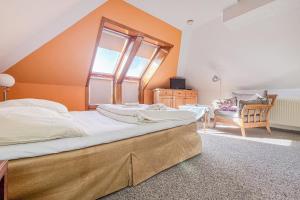 Ένα ή περισσότερα κρεβάτια σε δωμάτιο στο Villa Viktoria Whg 22 - "Min lütt Stuuv"
