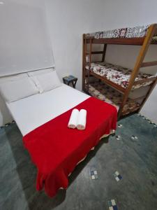 Postel nebo postele na pokoji v ubytování Pousada Familia Viva Trindade
