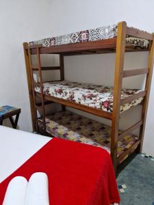 Postel nebo postele na pokoji v ubytování Pousada Familia Viva Trindade