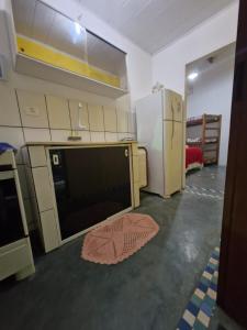 Kuchyň nebo kuchyňský kout v ubytování Pousada Familia Viva Trindade