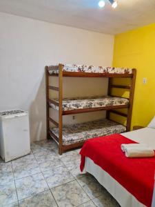 Postel nebo postele na pokoji v ubytování Pousada Familia Viva Trindade