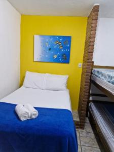 Postel nebo postele na pokoji v ubytování Pousada Familia Viva Trindade