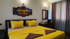 Voodi või voodid majutusasutuse Sun Dove Suite toas
