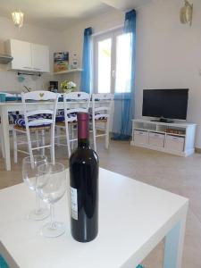 Μια τηλεόραση ή/και κέντρο ψυχαγωγίας στο Apartmani Kvesic - Azzurro
