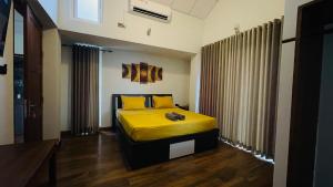 Voodi või voodid majutusasutuse Sun Dove Suite toas