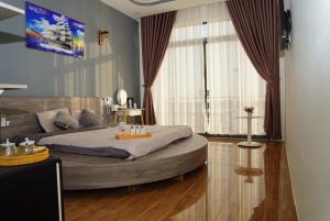 Et opholdsområde på Villa - Homestay Giác