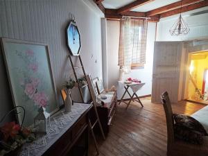 a room with a table and a mirror on the wall at villa lanterna in Conversano +43 photos