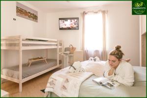 Postel nebo postele na pokoji v ubytování B&B Casaffitti