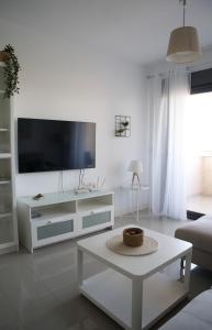 TV a/nebo společenská místnost v ubytování Playa Marinsa Torre del Mar