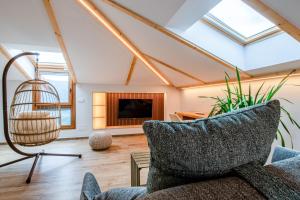 Μια τηλεόραση ή/και κέντρο ψυχαγωγίας στο Suites Ecojebar