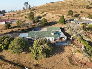 an aerial view of a house on a hill at Otentik guesthouse in Mbabane