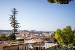 a view of the city from the top at Living Villanova Apartment in Cagliari +50 photos