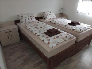 Postel nebo postele na pokoji v ubytování Domeček se sluncem