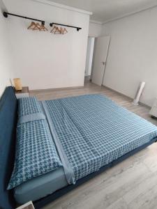 Postel nebo postele na pokoji v ubytování SuecaRoom