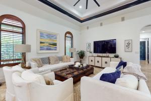 Télévision ou salle de divertissement dans l'établissement Paradise