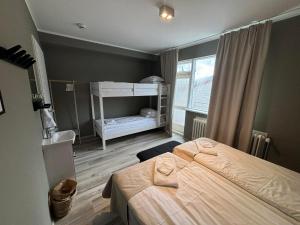 Tempat tidur dalam kamar di Klara Guesthouse