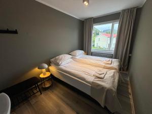Tempat tidur dalam kamar di Klara Guesthouse