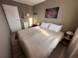 Tempat tidur dalam kamar di Klara Guesthouse