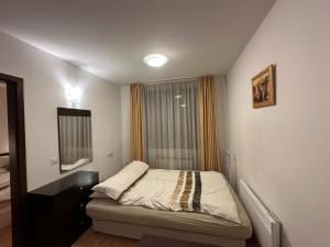 En eller flere senge i et værelse på Mountain Paradise 2, One bedroom apartment