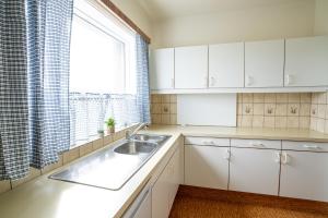 Kuchyň nebo kuchyňský kout v ubytování The Nest