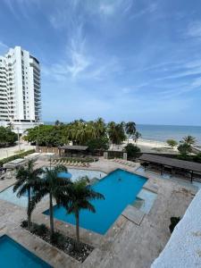 a view of a pool at ocean pearl resort spa at Apartamento salida al Mar Santa Marta in Santa Marta