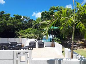 Garður fyrir utan Villa Yukuru Ishigaki - ビーチ付きヴィラ