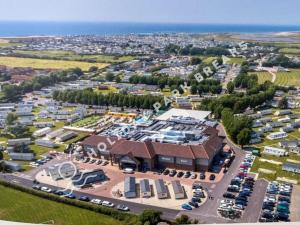 an aerial view of a building with a parking lot at Driftwood - Bronze 3 bedroom West Sands Sleeps 8 in Selsey