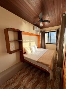 Postel nebo postele na pokoji v ubytování Cantinho do Eden - Pontal de Coruripe - em frente a praia com garage privativo