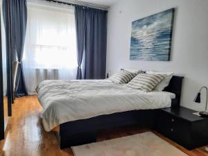 Postel nebo postele na pokoji v ubytování Apartment Maria Belgrade Residence