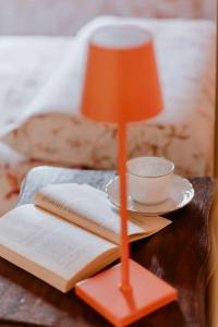 A bed or beds in a room at Sky & Vineyards - Melograno -