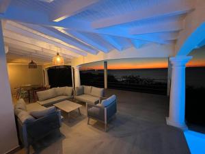 Χώρος καθιστικού στο Villa Happy View - Vue mer paradisiaque - Piscine