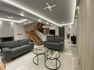 Χώρος καθιστικού στο Sea Breeze Sea View Villa