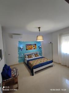 Posteľ alebo postele v izbe v ubytovaní B&B Angelina